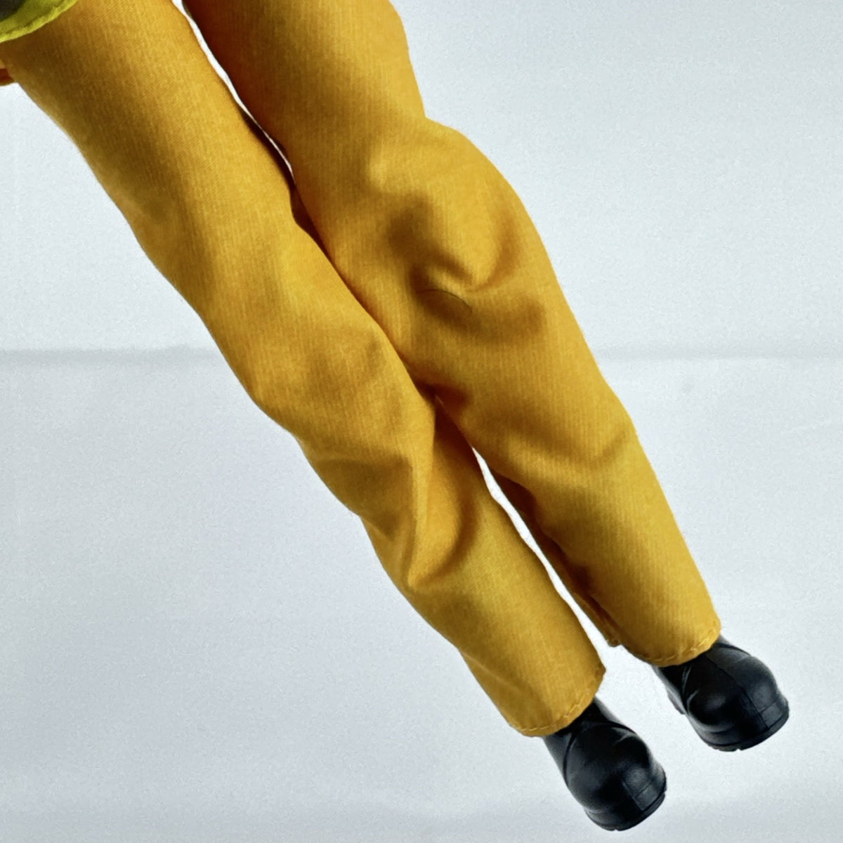 Mattel Barbie Careers blonde firefighter doll wearing yellow rescue suit and black boots