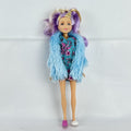 Just Play Hairdorables Hairmazing Harmony fashion doll with purple hair, floral romper, and light blue faux fur vest