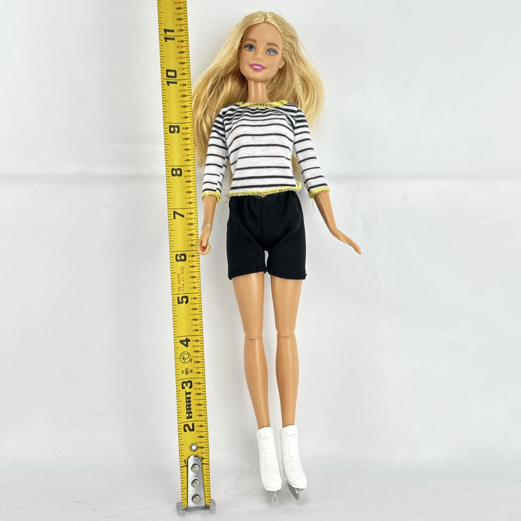 Mattel Barbie blonde ice skater doll with articulated knees wearing a striped athletic outfit and white skates