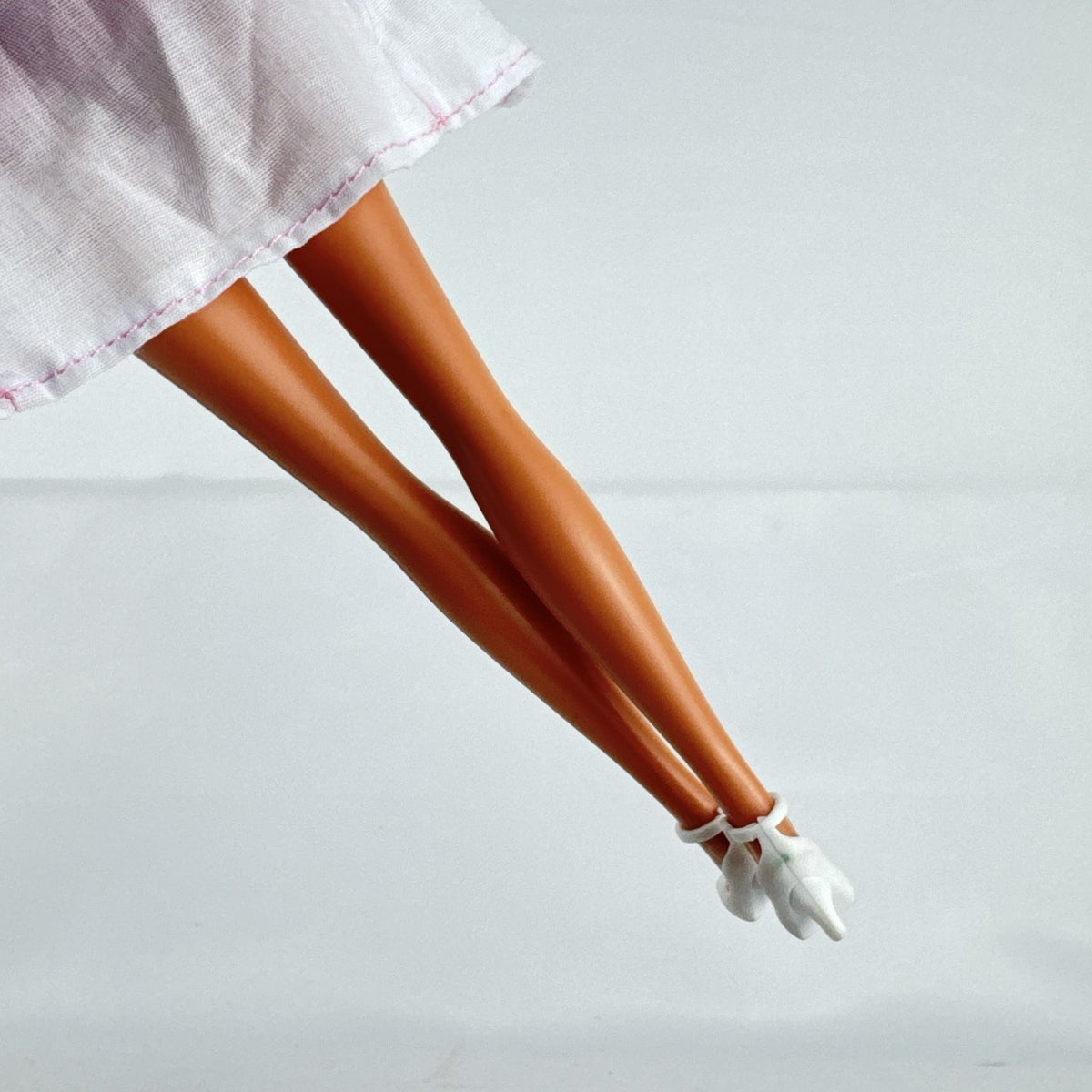 Simba Steffi Love blonde doctor doll wearing a white lab coat and pink knit dress