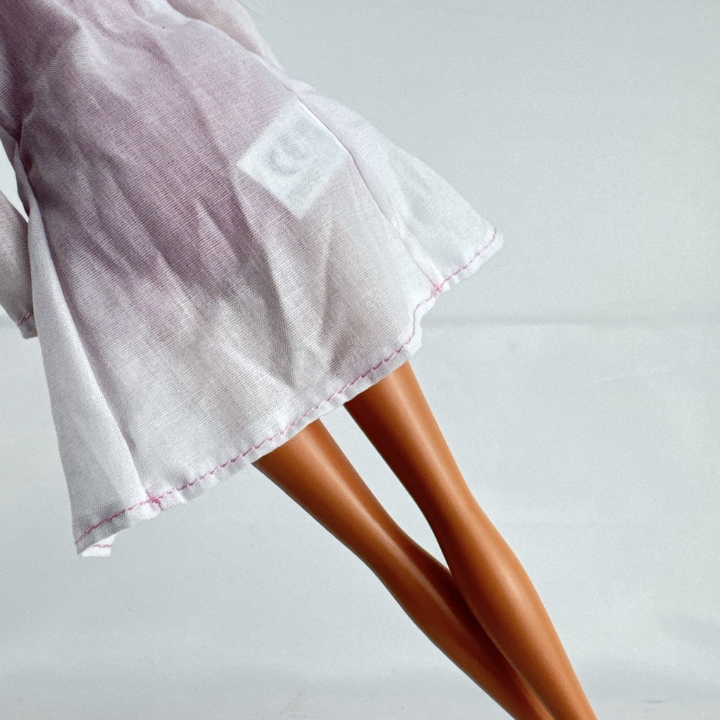 Simba Steffi Love blonde doctor doll wearing a white lab coat and pink knit dress