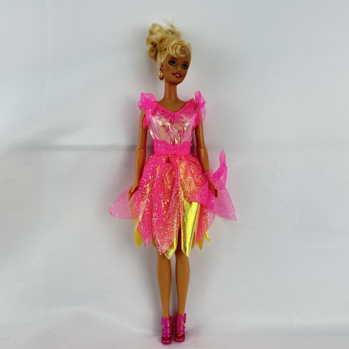 1998 Mattel blonde fairy Barbie doll in iridescent pink sparkle dress with pull-string twirling skirt