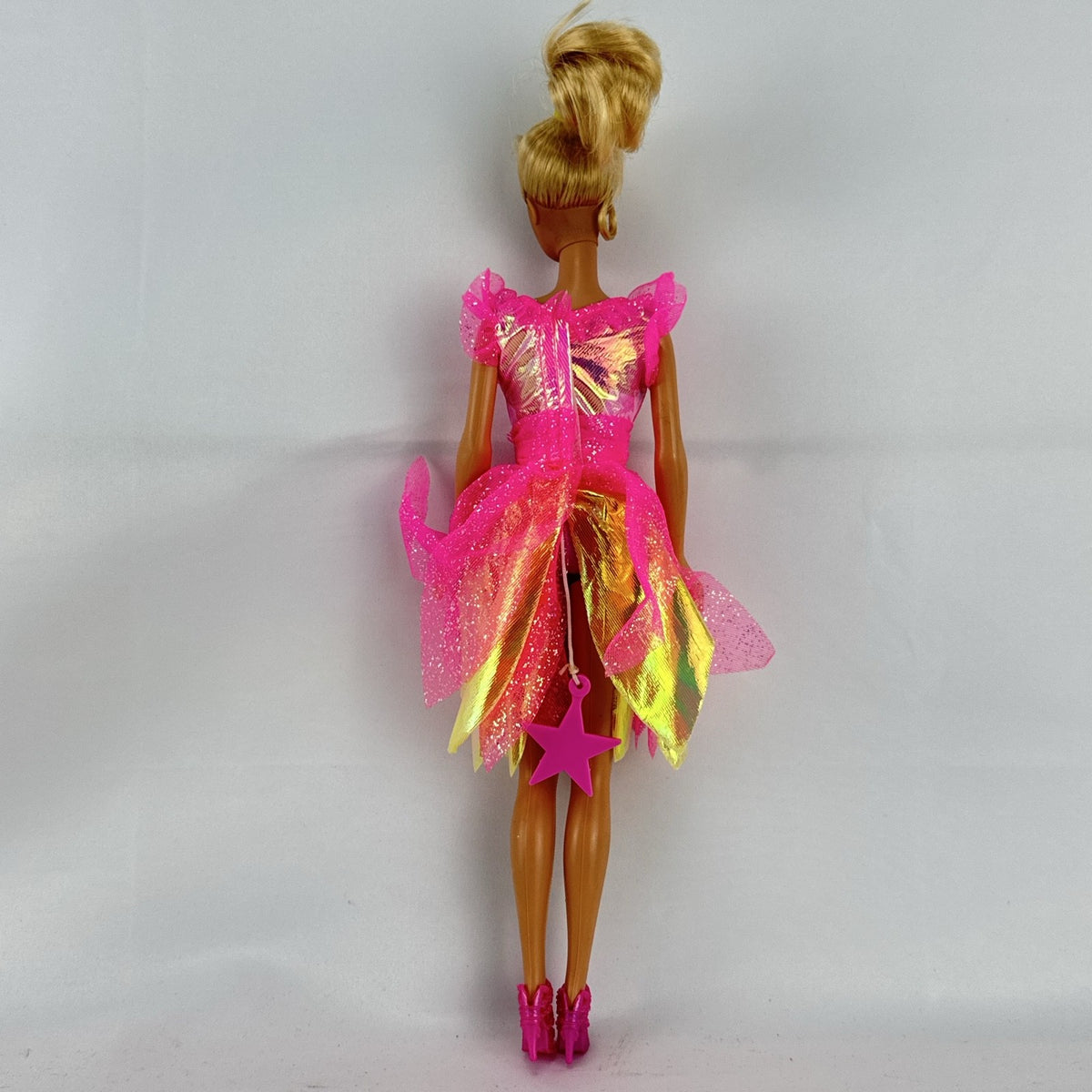 1998 Mattel blonde fairy Barbie doll in iridescent pink sparkle dress with pull-string twirling skirt