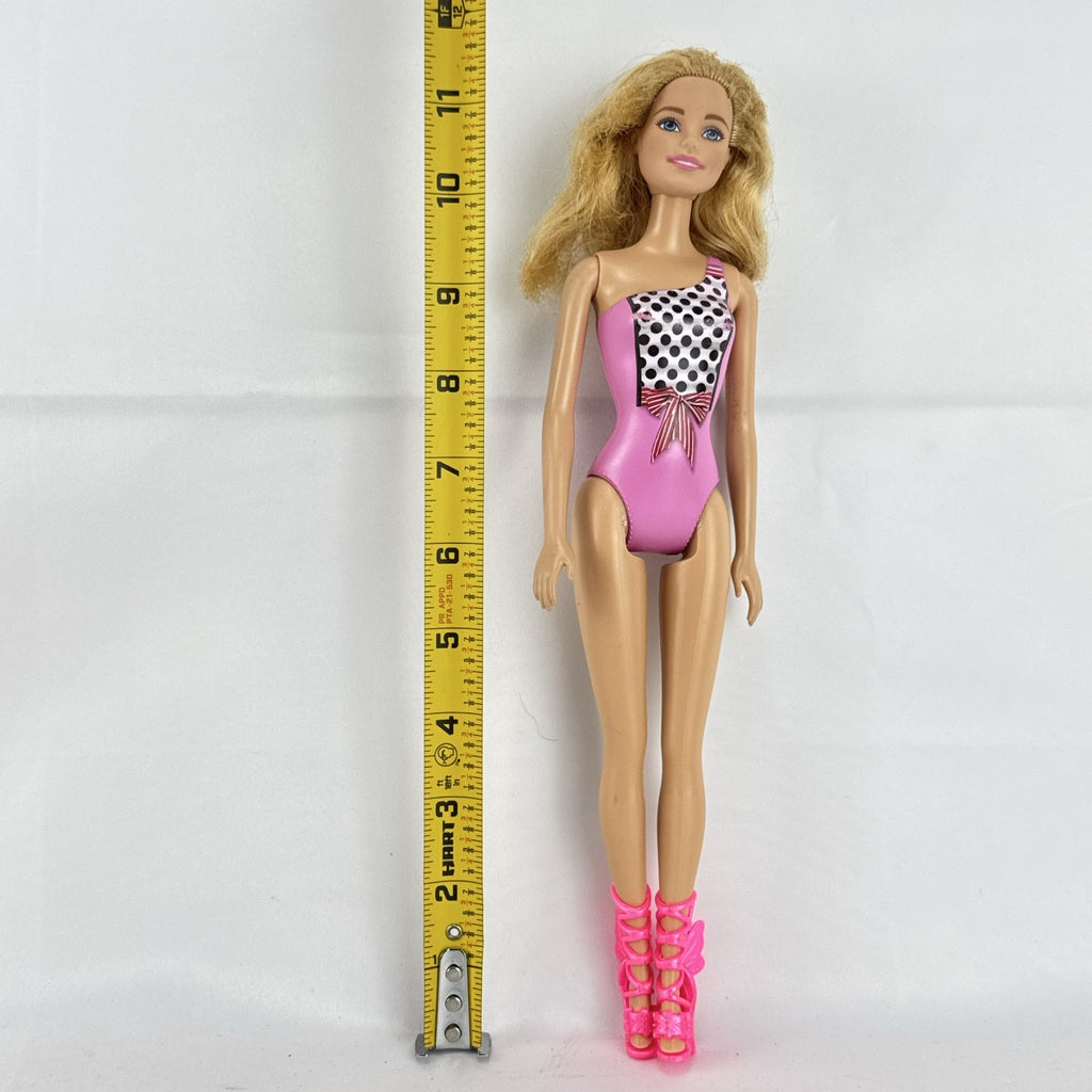 Mattel Barbie 11-inch doll wearing molded pink and polka dot swimsuit with pink strappy heels