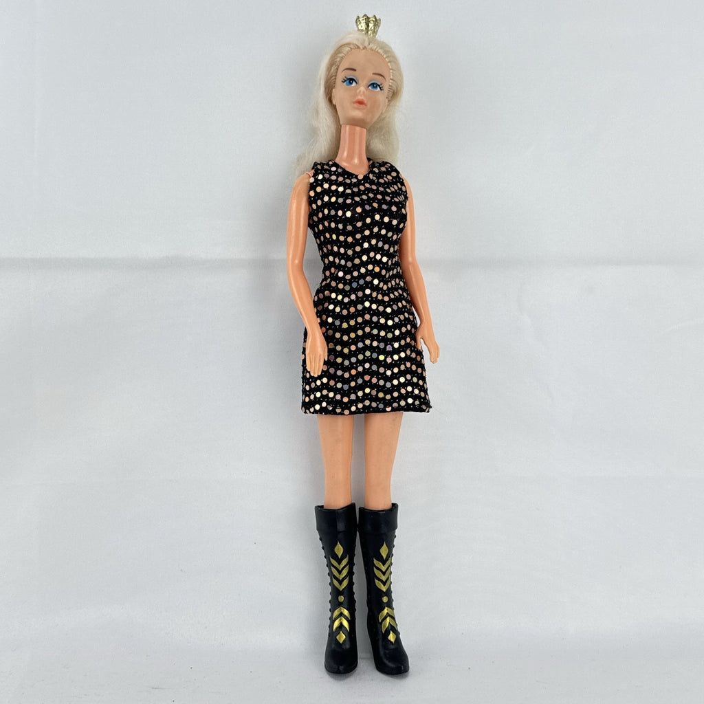 Mattel blonde Barbie doll with Twist 'N Turn body wearing a black sequin dress and gold crown