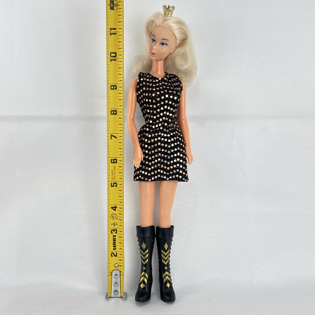 Mattel blonde Barbie doll with Twist 'N Turn body wearing a black sequin dress and gold crown
