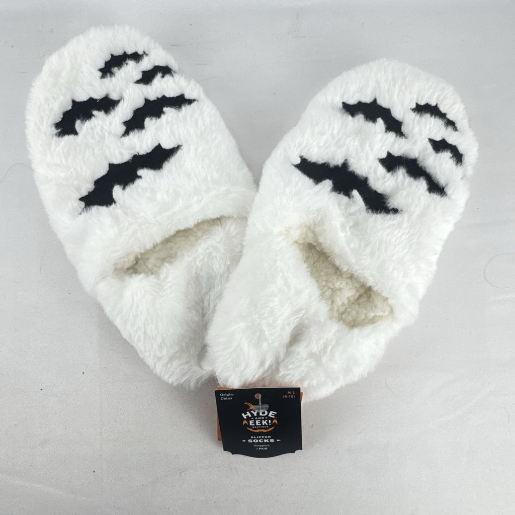 Hyde & EEK! Boutique ivory faux-fur slipper socks with black bat silhouettes and non-slip treads in women's size M/L.