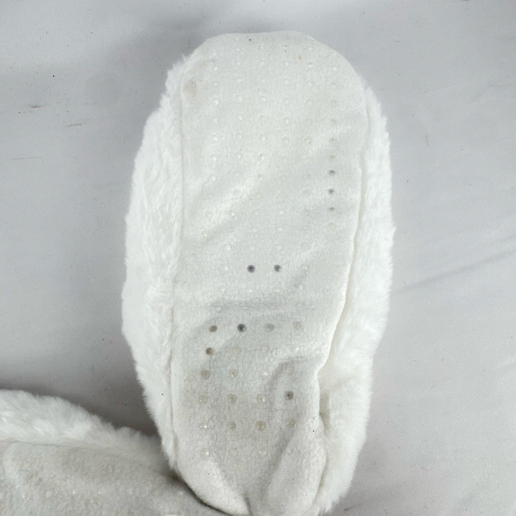 Hyde & EEK! Boutique ivory faux-fur slipper socks with black bat silhouettes and non-slip treads in women's size M/L.