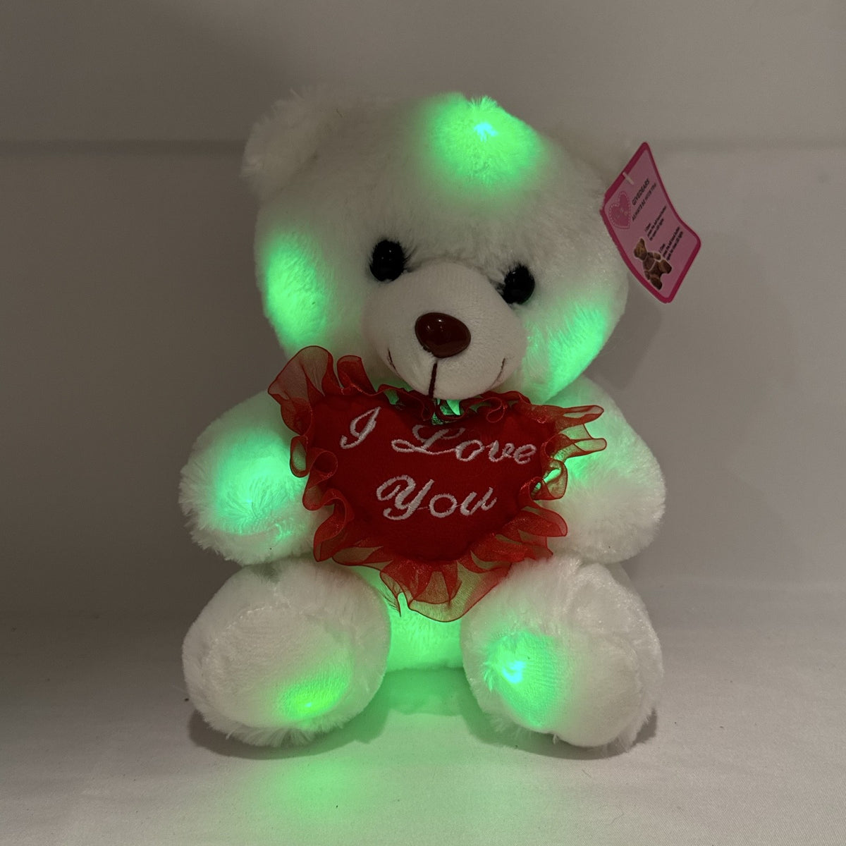 Givedears white plush teddy bear with illuminated LED lights holding an embroidered red I Love You heart