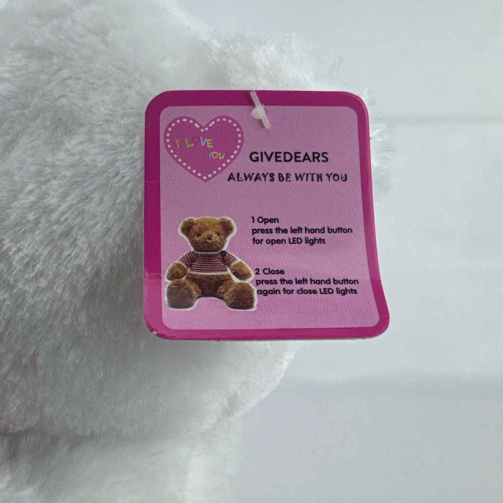 Givedears white plush teddy bear with illuminated LED lights holding an embroidered red I Love You heart