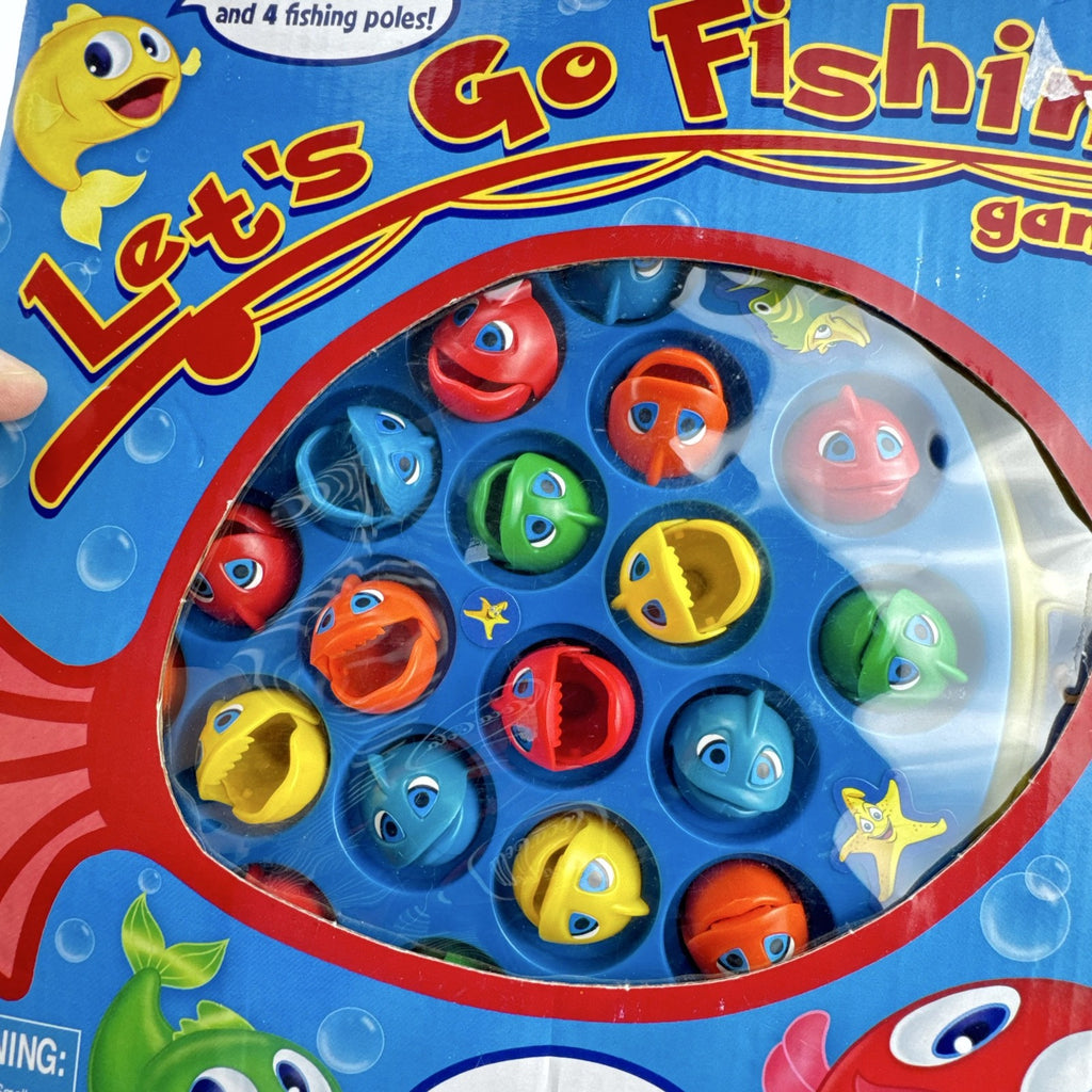 Pressman Let's Go Fishin' motorized action board game in original box with 21 fish and 4 poles
