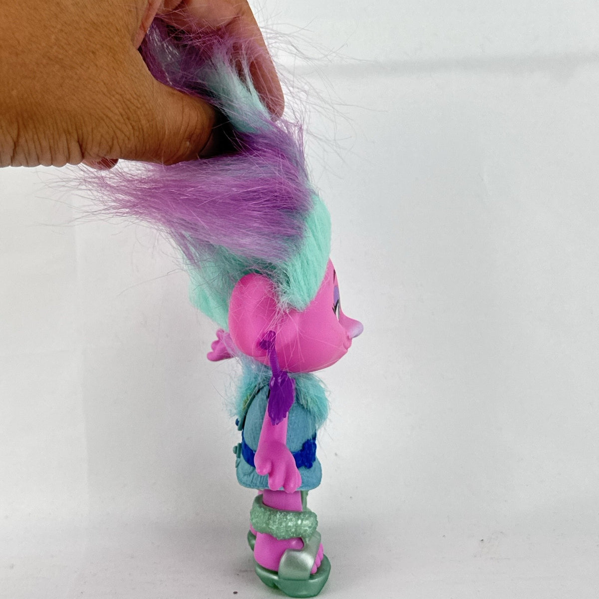 Hasbro DreamWorks Trolls Chenille 8-inch fashion doll with teal and purple hair and platform shoes