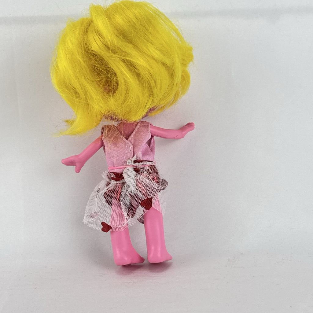 Mattel Trolls Band Together Viva 7-inch articulated doll with yellow hair and heart-accented tulle skirt