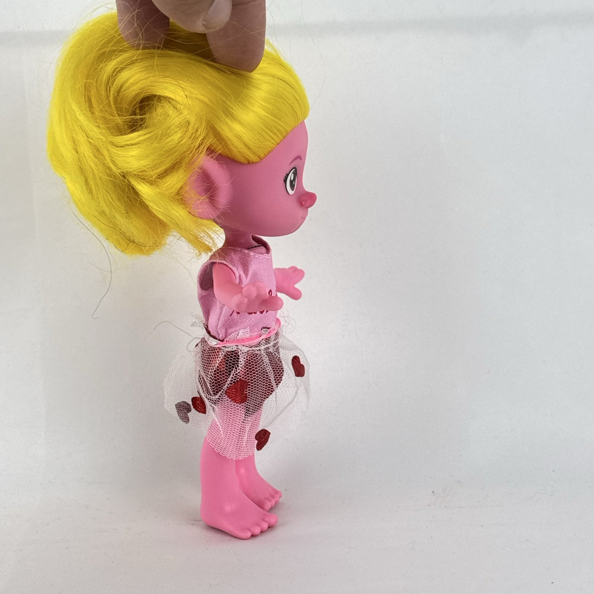 Mattel Trolls Band Together Viva 7-inch articulated doll with yellow hair and heart-accented tulle skirt