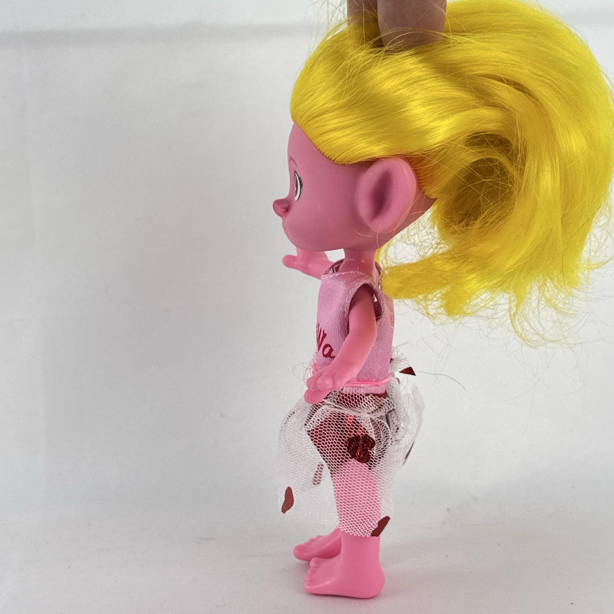Mattel Trolls Band Together Viva 7-inch articulated doll with yellow hair and heart-accented tulle skirt