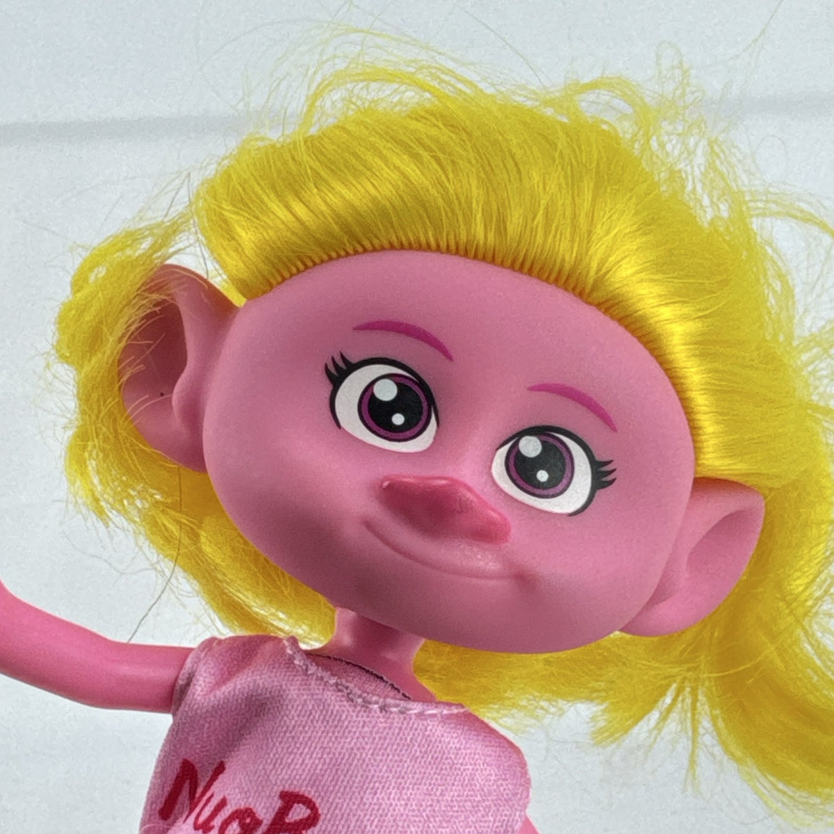 Mattel Trolls Band Together Viva 7-inch articulated doll with yellow hair and heart-accented tulle skirt