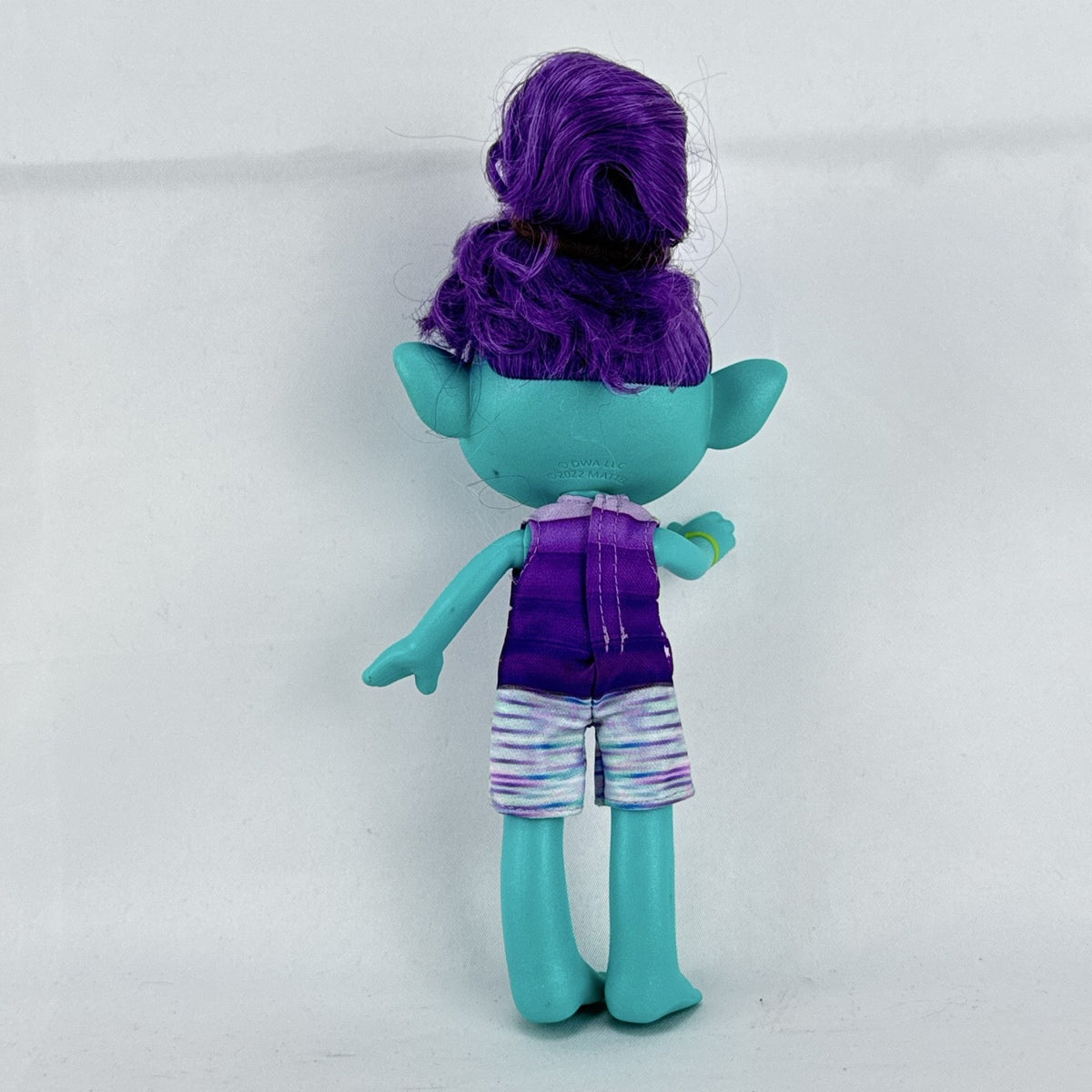 Mattel DreamWorks Trolls Band Together Bruce 8-inch doll in BroZone vest and shorts with purple hair bun