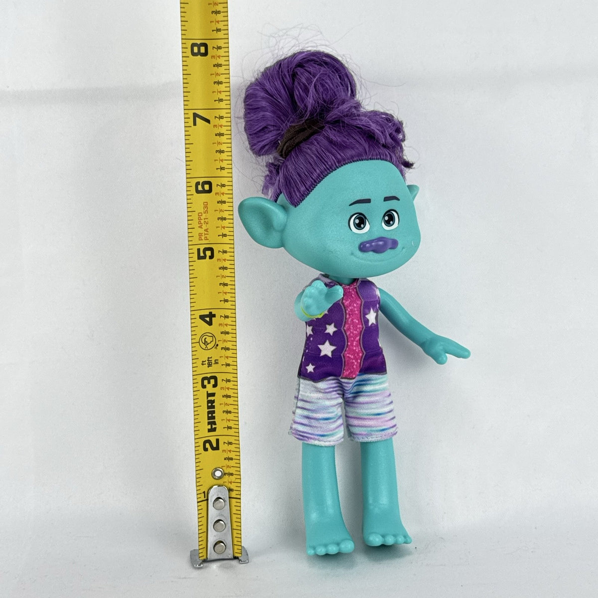 Mattel DreamWorks Trolls Band Together Bruce 8-inch doll in BroZone vest and shorts with purple hair bun