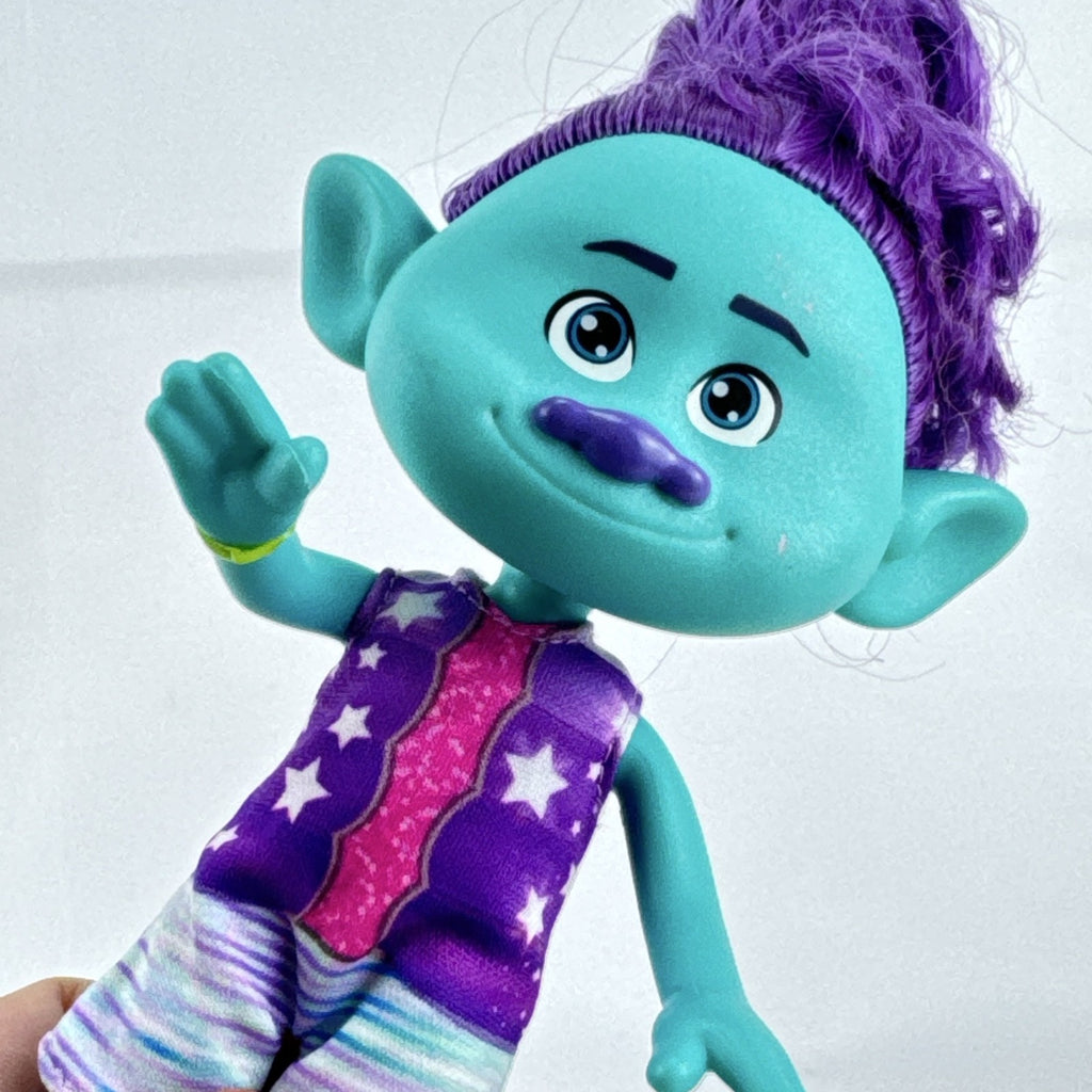 Mattel DreamWorks Trolls Band Together Bruce 8-inch doll in BroZone vest and shorts with purple hair bun