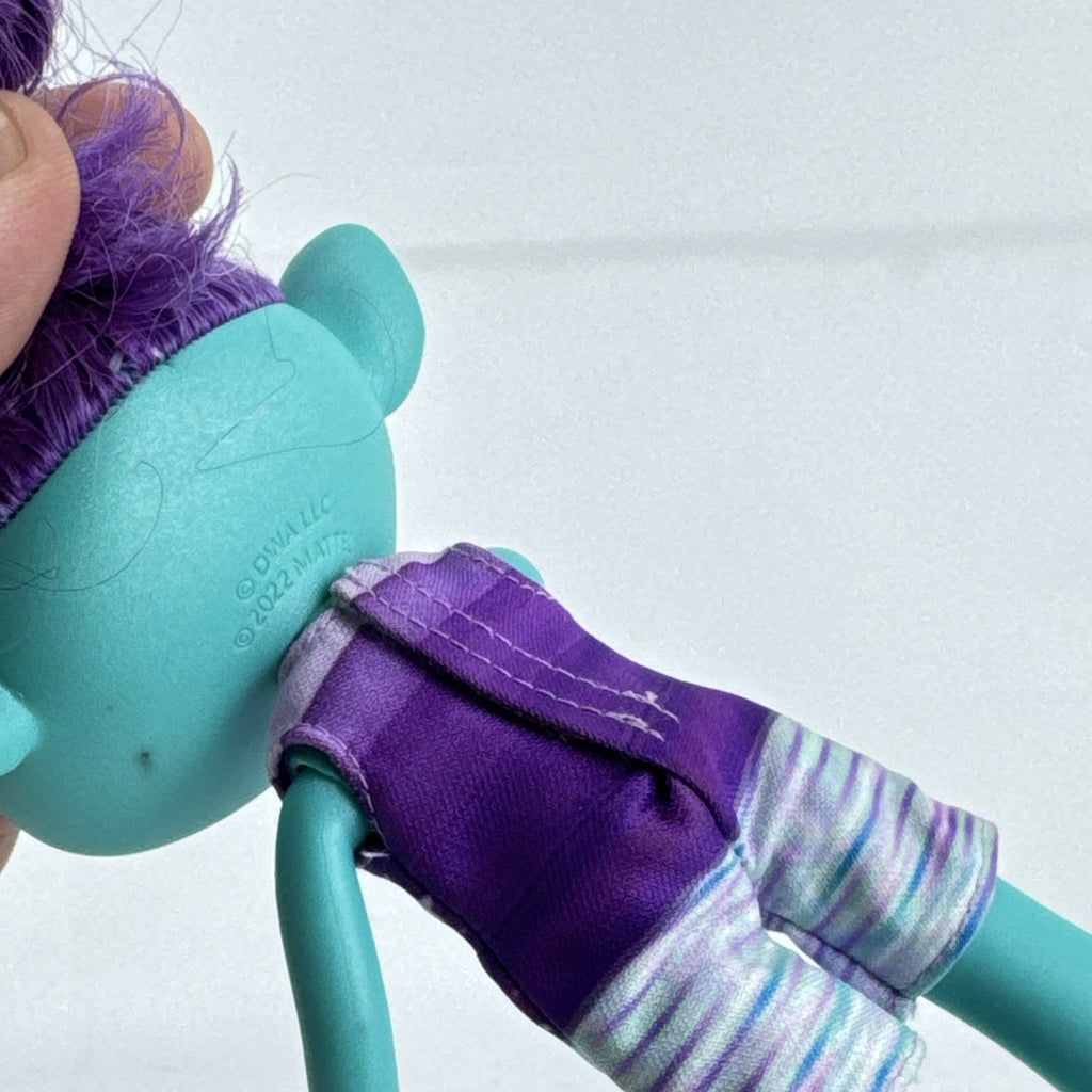 Mattel DreamWorks Trolls Band Together Bruce 8-inch doll in BroZone vest and shorts with purple hair bun