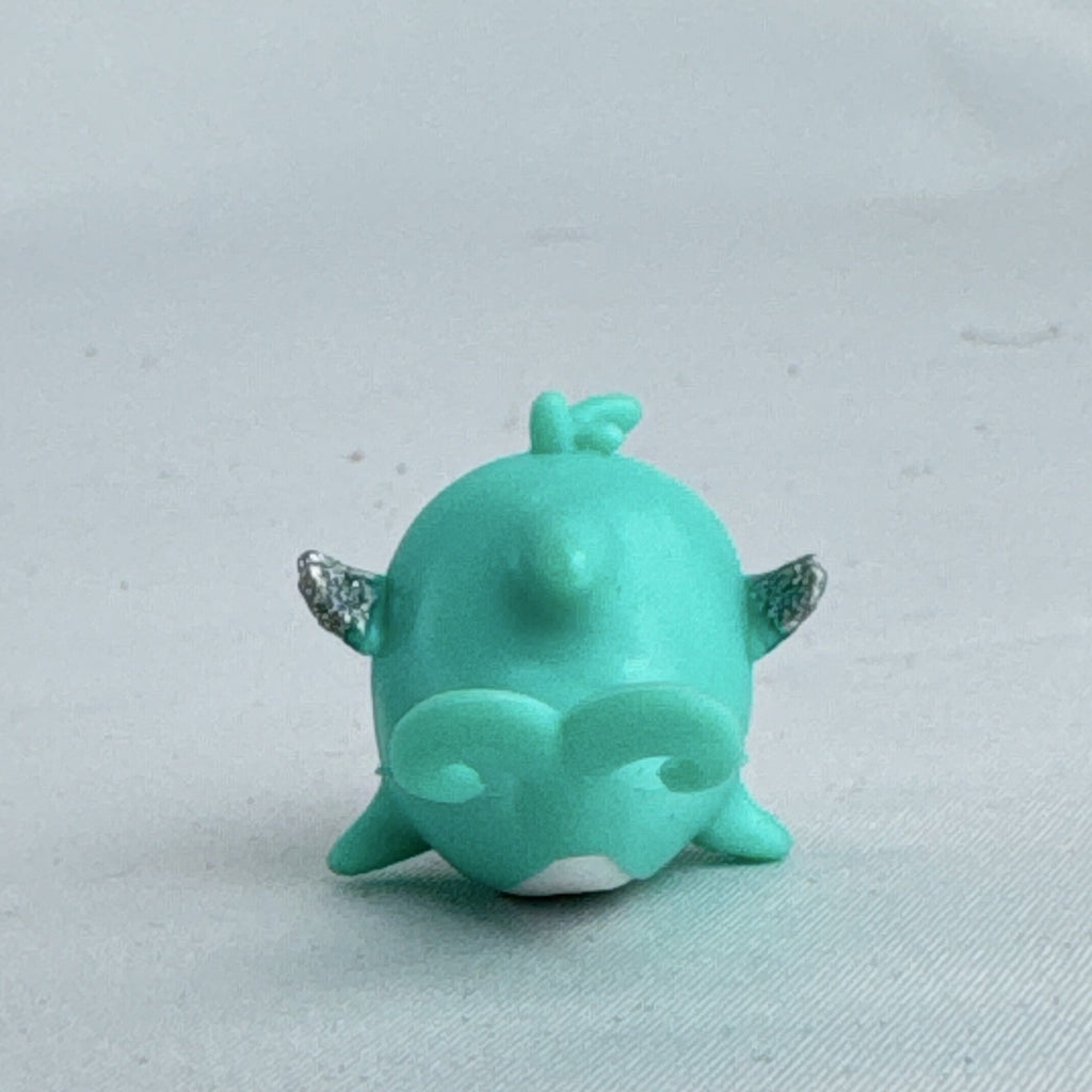 Spin Master Hatchimals CollEGGtibles Mermal Magic teal dolphin miniature figure with silver glitter wings