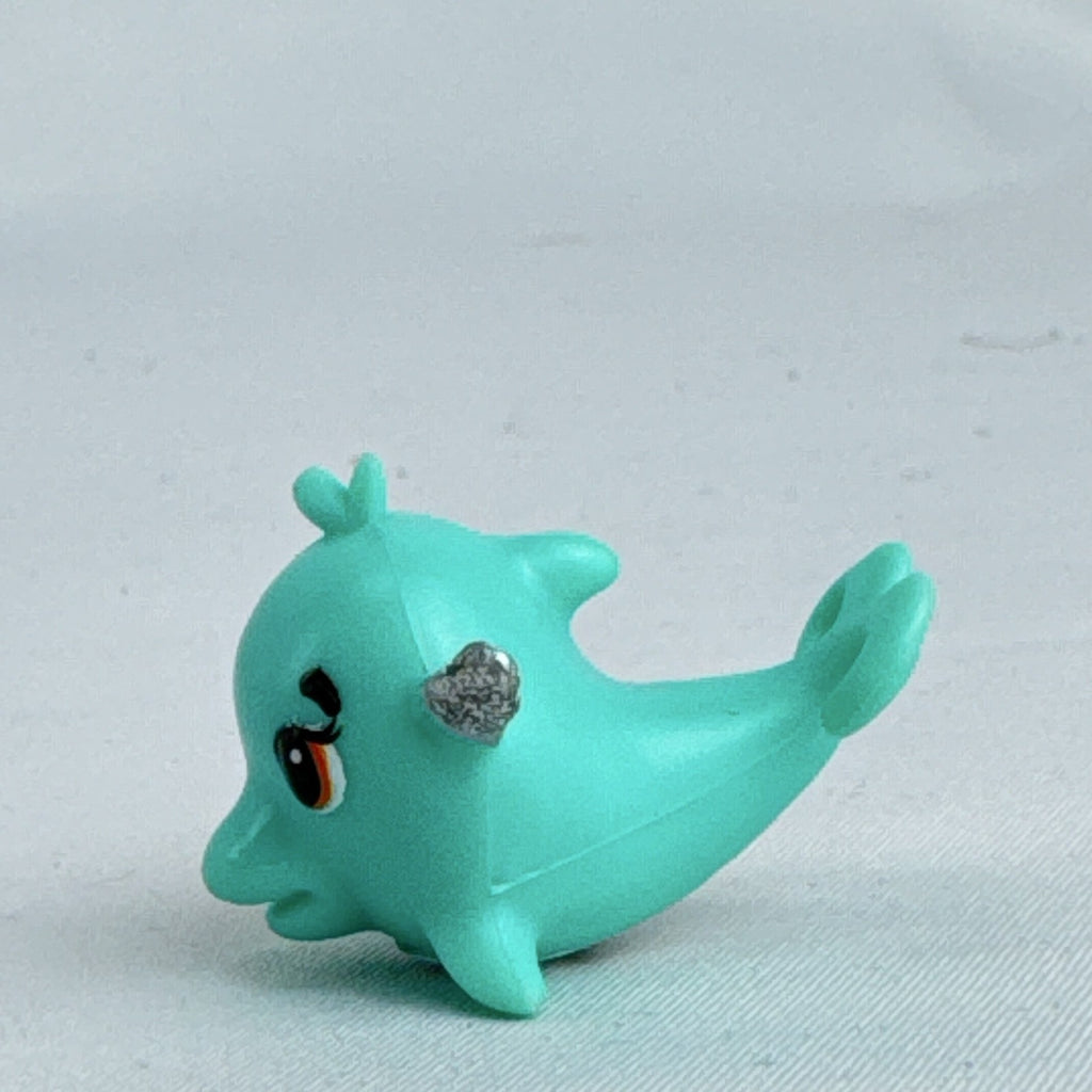 Spin Master Hatchimals CollEGGtibles Mermal Magic teal dolphin miniature figure with silver glitter wings