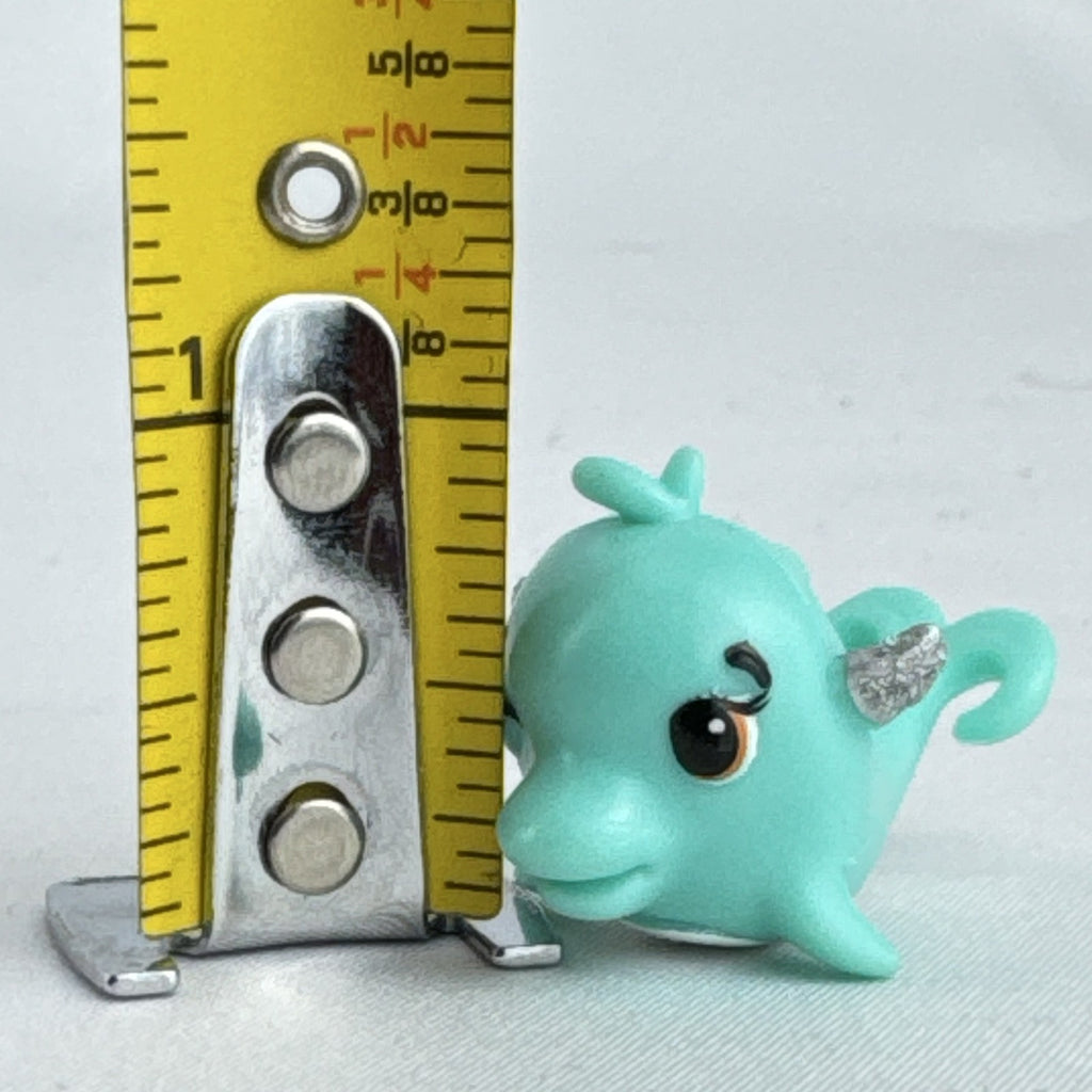 Spin Master Hatchimals CollEGGtibles Mermal Magic teal dolphin miniature figure with silver glitter wings