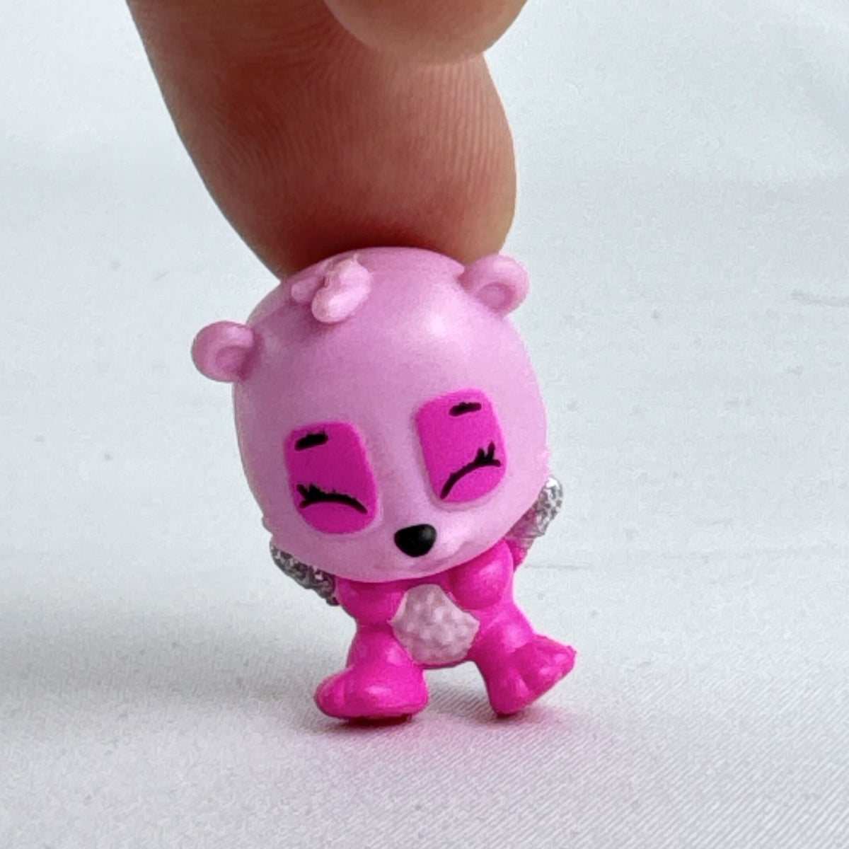 Spin Master Hatchimals CollEGGtibles pink panda miniature figure with silver glitter wings