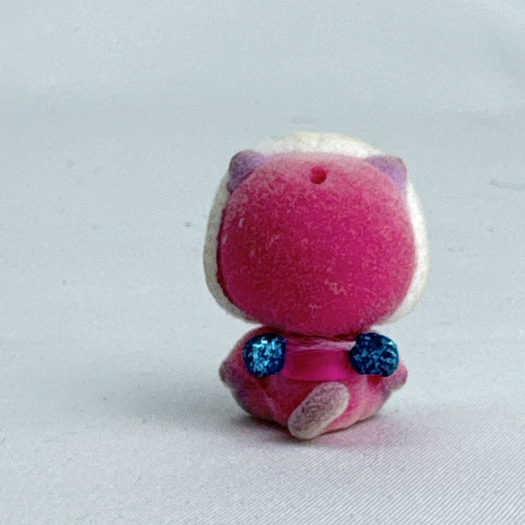 Spin Master Hatchimals CollEGGtibles flocked pink and purple bear mini figure with blue glitter wings