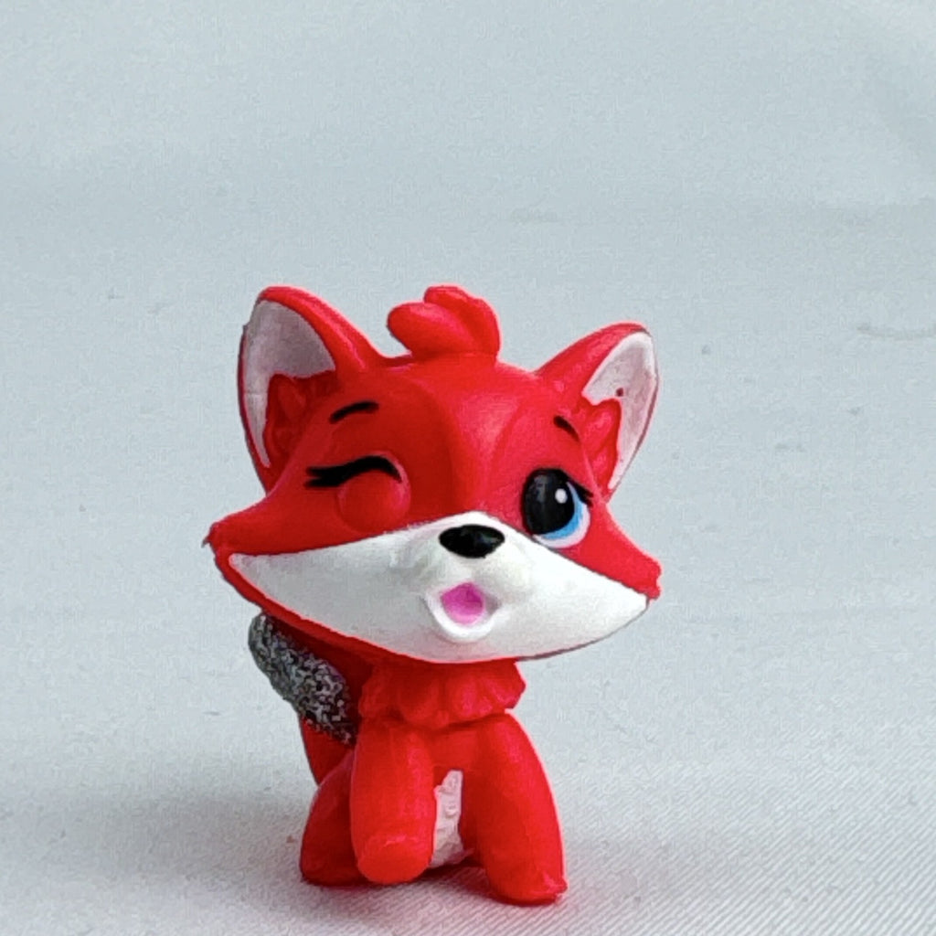 Spin Master Hatchimals Colleggtibles red fox miniature figure with silver glitter wings and winking face