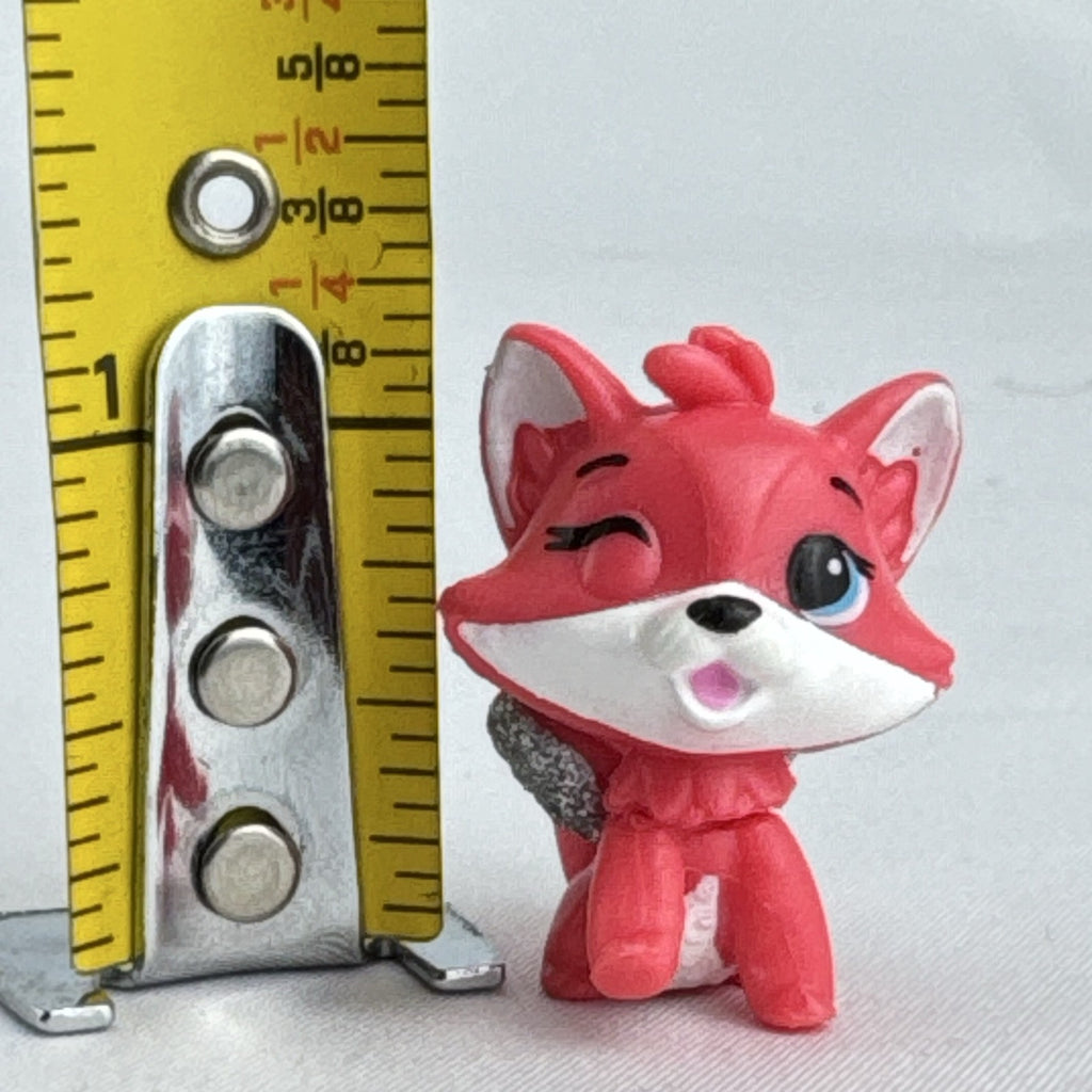 Spin Master Hatchimals Colleggtibles red fox miniature figure with silver glitter wings and winking face