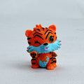 Spin Master Hatchimals Colleggtibles orange tiger miniature figure with silver glitter wings