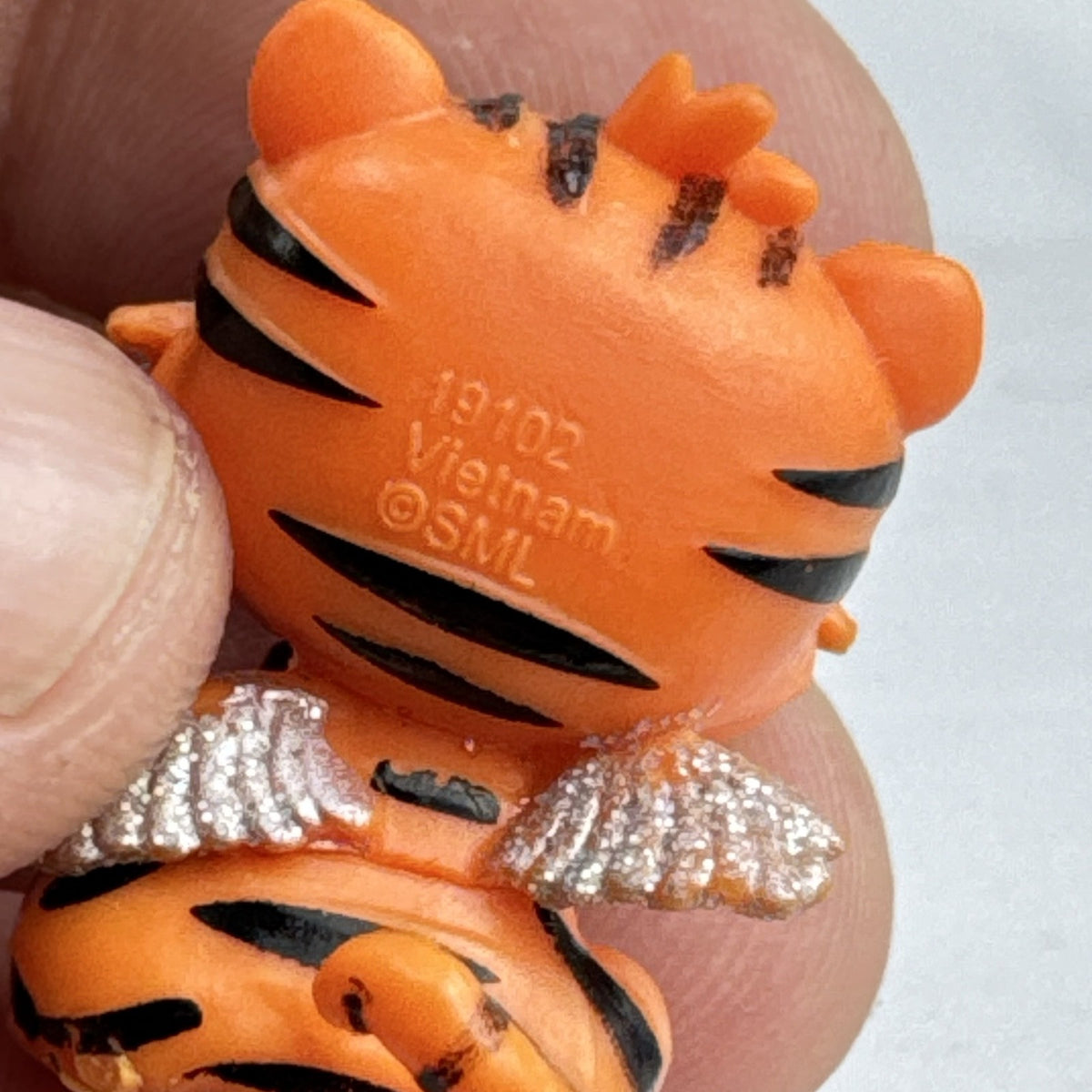 Spin Master Hatchimals Colleggtibles orange tiger miniature figure with silver glitter wings