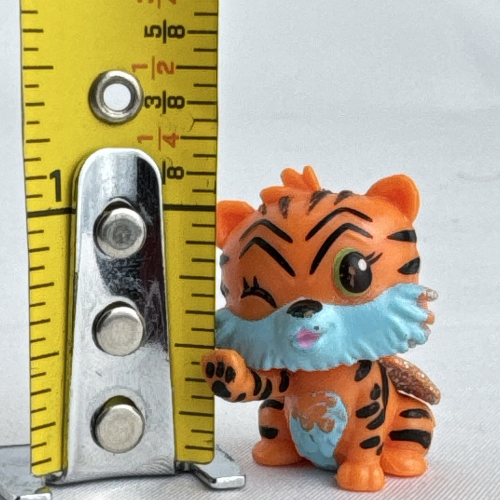 Spin Master Hatchimals Colleggtibles orange tiger miniature figure with silver glitter wings