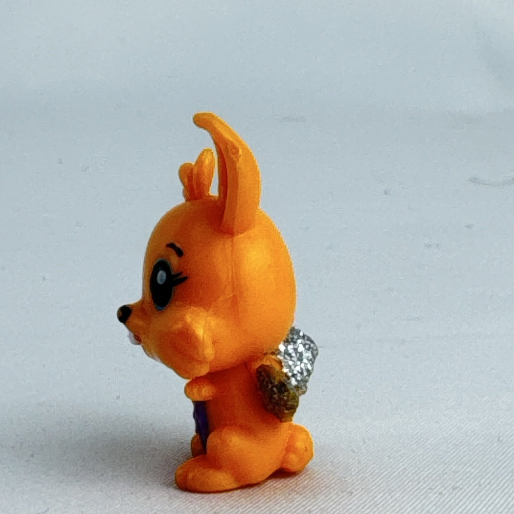 Spin Master Hatchimals CollEGGtibles orange winking bunny rabbit mini figure with silver glitter wings