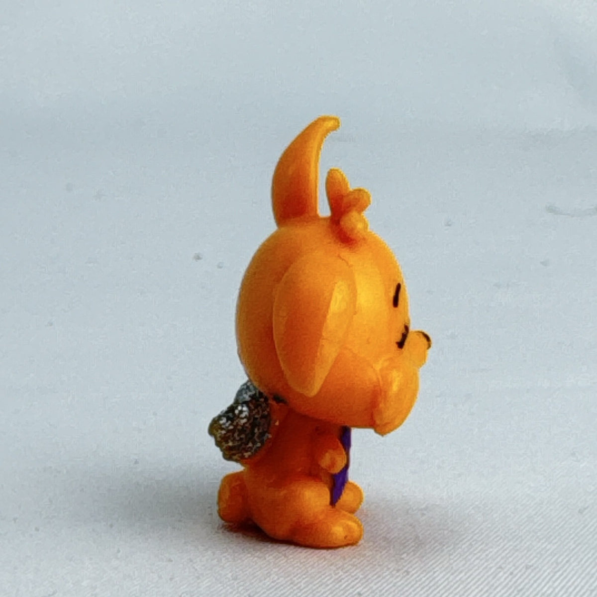 Spin Master Hatchimals CollEGGtibles orange winking bunny rabbit mini figure with silver glitter wings