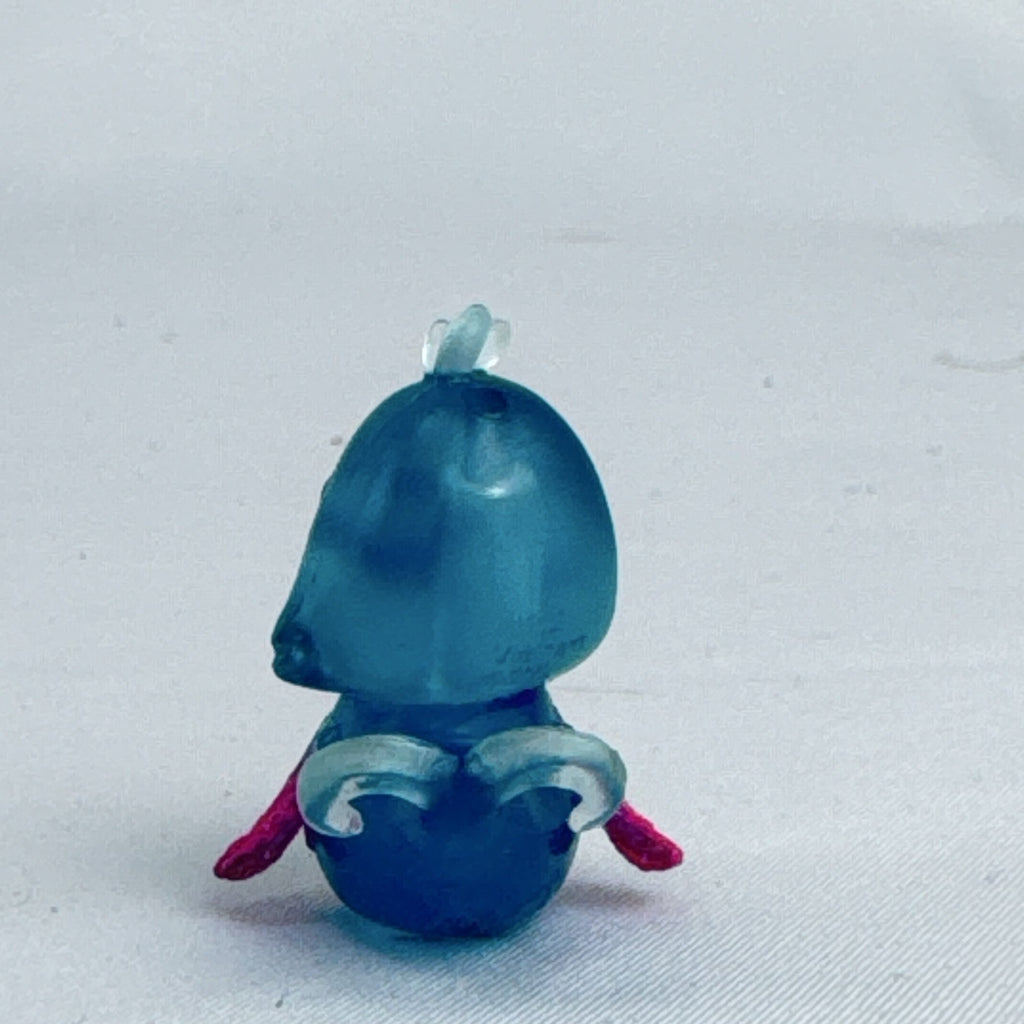 Spin Master Hatchimals CollEGGtibles translucent blue winking seal mini figure with pink glitter