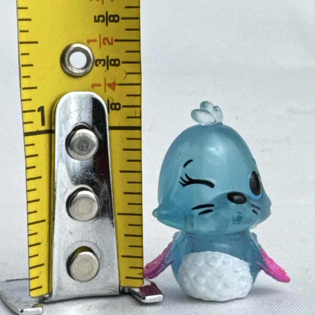 Spin Master Hatchimals CollEGGtibles translucent blue winking seal mini figure with pink glitter