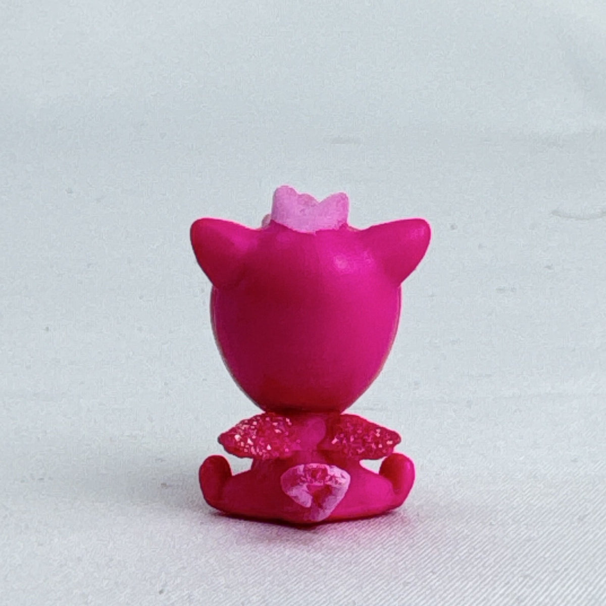 Spin Master Hatchimals pink dragon miniature figure with glitter wings