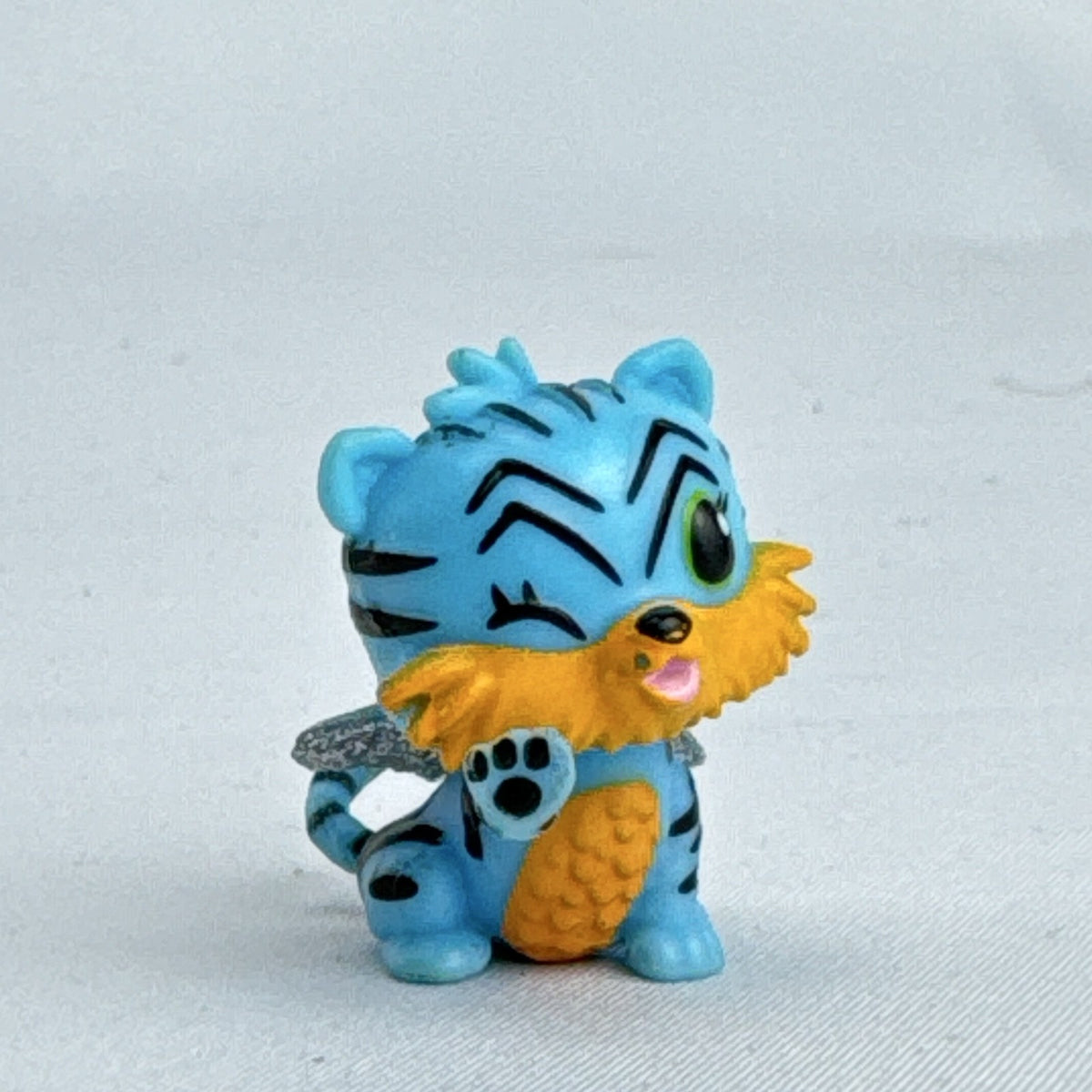 Spin Master Hatchimals CollEGGtibles blue tiger mini figure with silver glitter wings