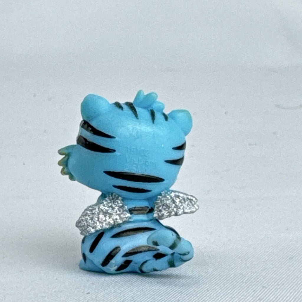 Spin Master Hatchimals CollEGGtibles blue tiger mini figure with silver glitter wings
