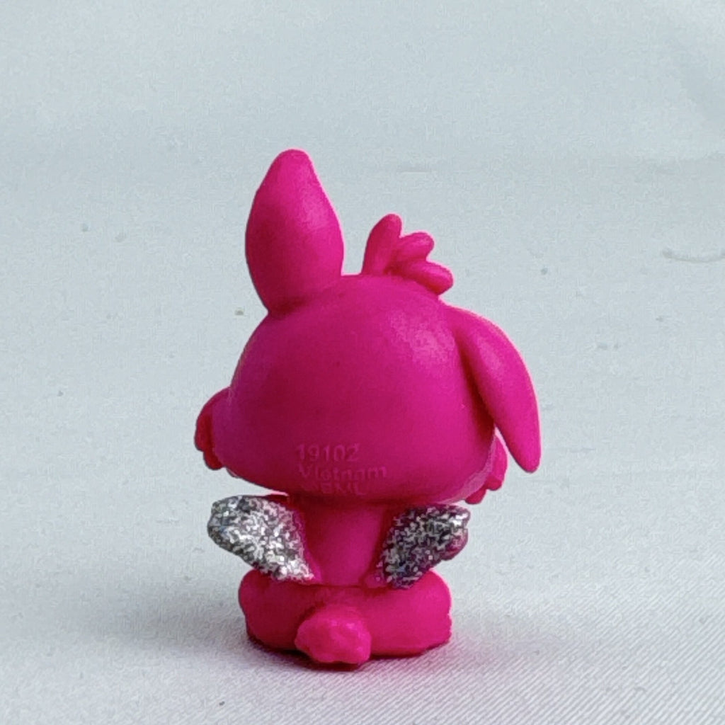 Spin Master Hatchimals CollEGGtibles pink winking bunny figure with silver glitter wings