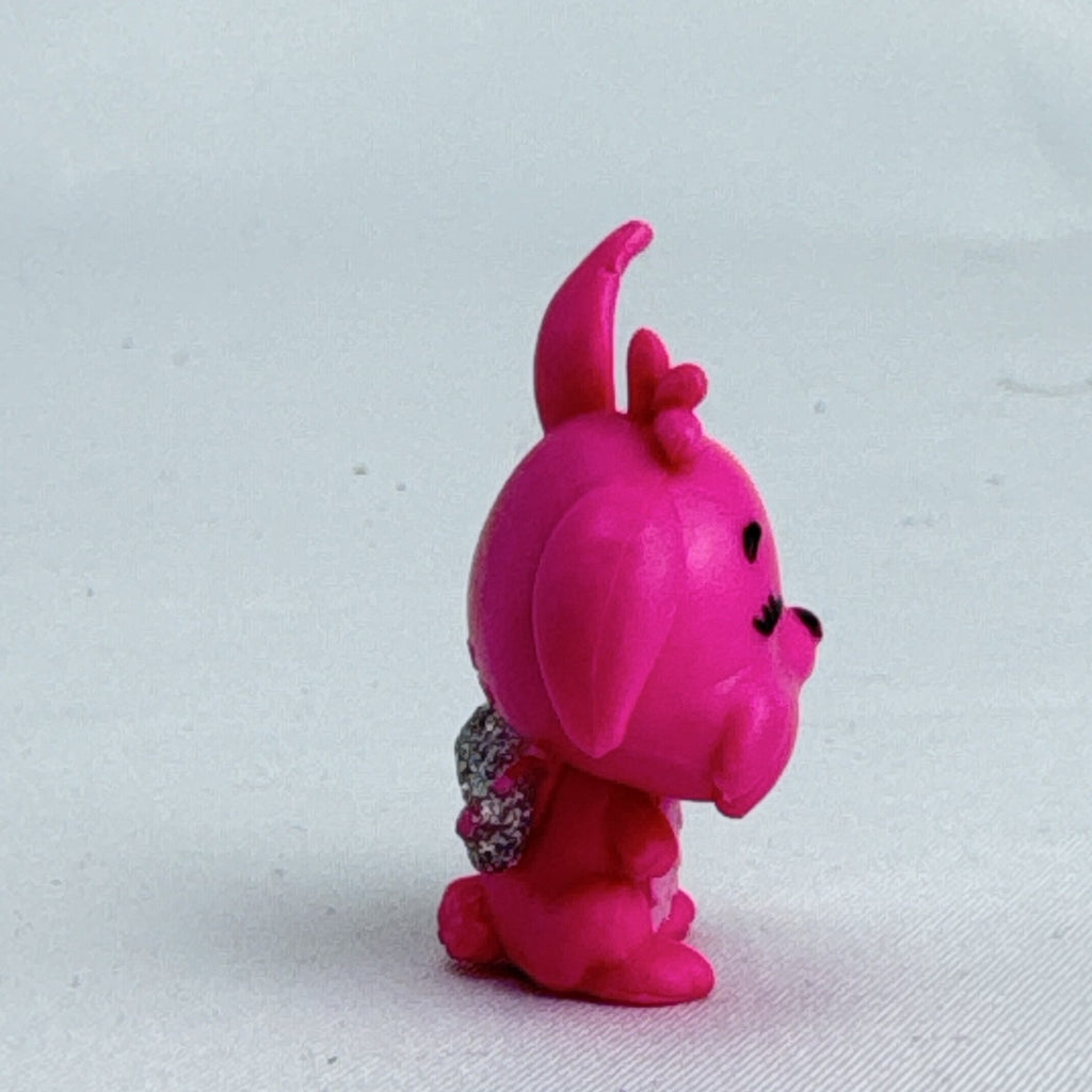 Spin Master Hatchimals CollEGGtibles pink winking bunny figure with silver glitter wings
