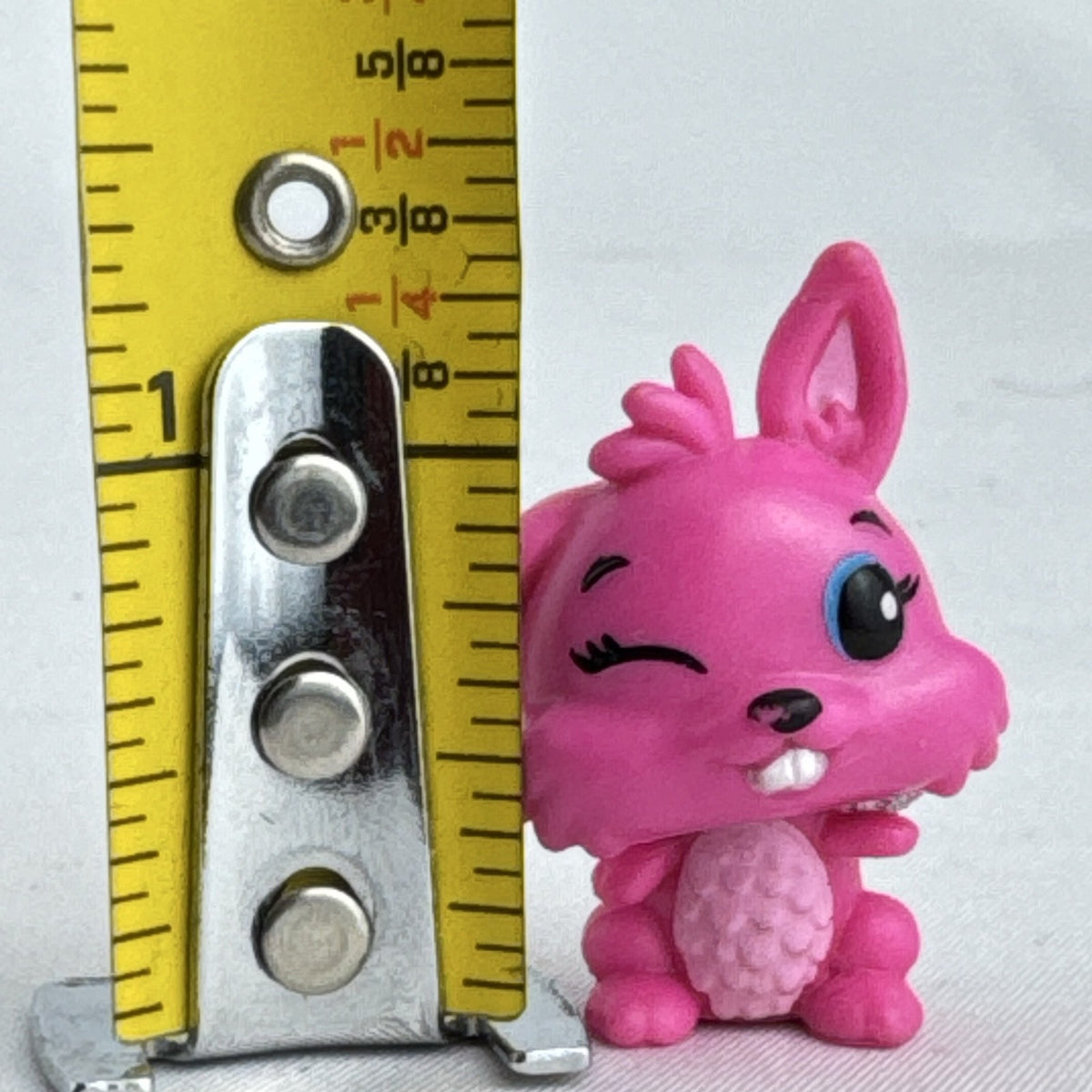 Spin Master Hatchimals CollEGGtibles pink winking bunny figure with silver glitter wings