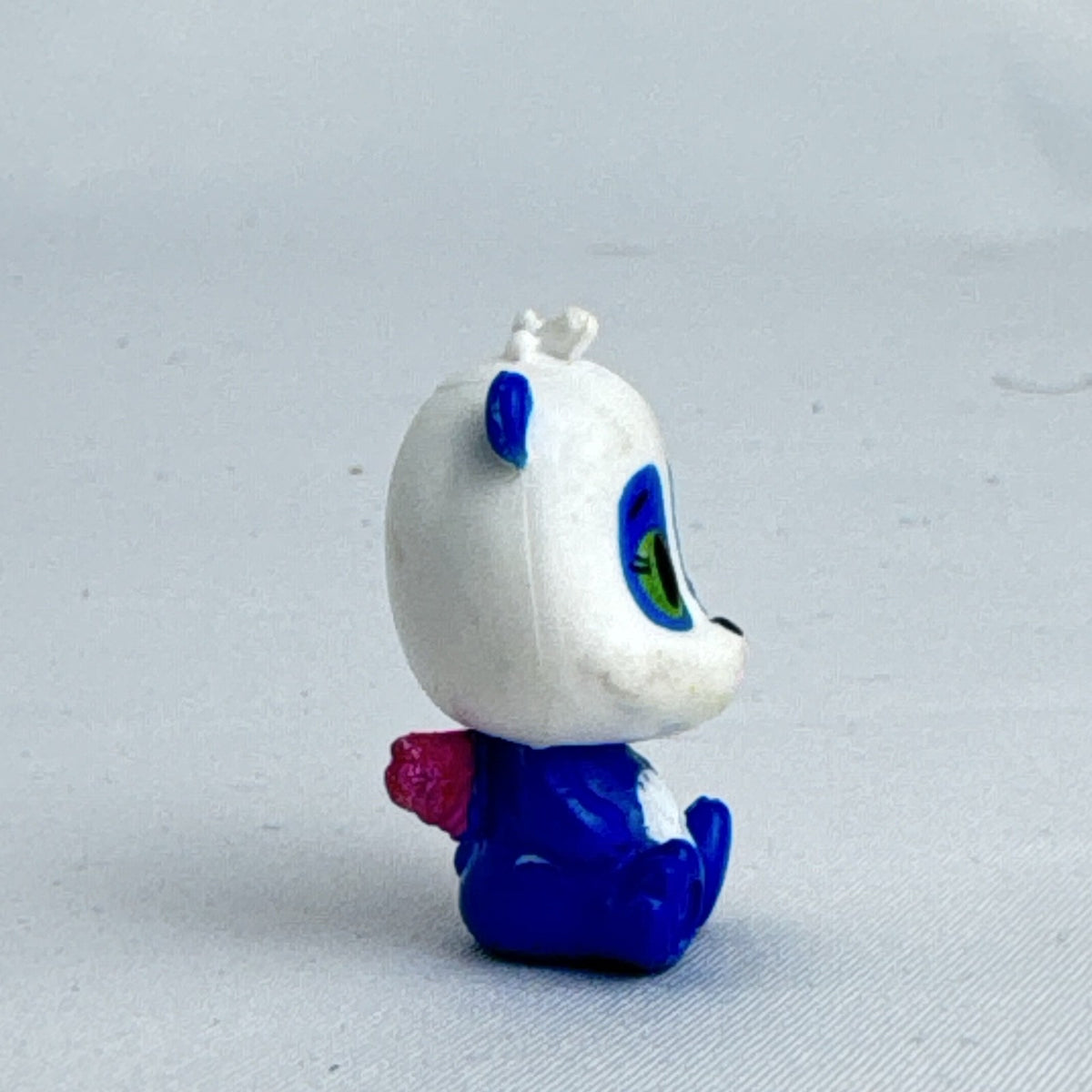 Spin Master Hatchimals Pandor panda mini figure with winking eye and pink glitter wings