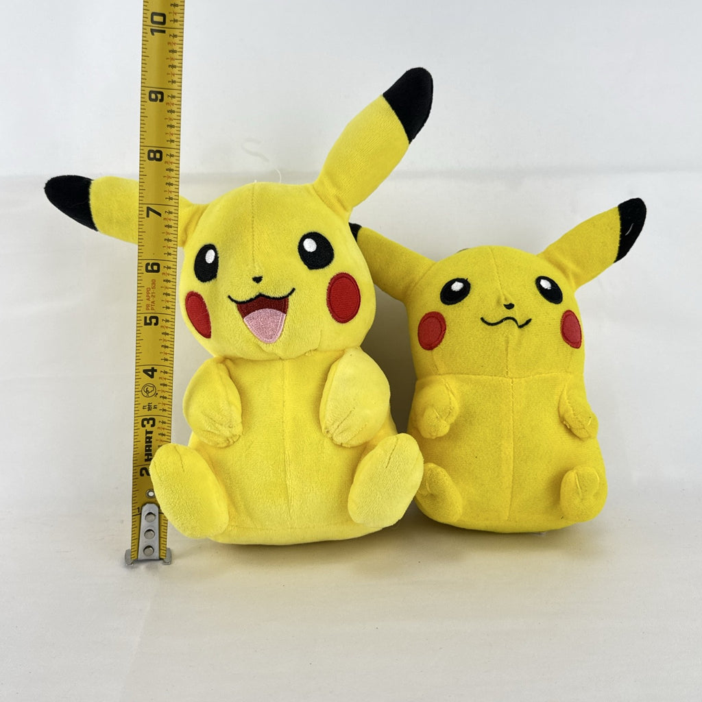 Pair of two yellow Pokémon Pikachu plush stuffed animals in 7-inch and 8.5-inch sizes.