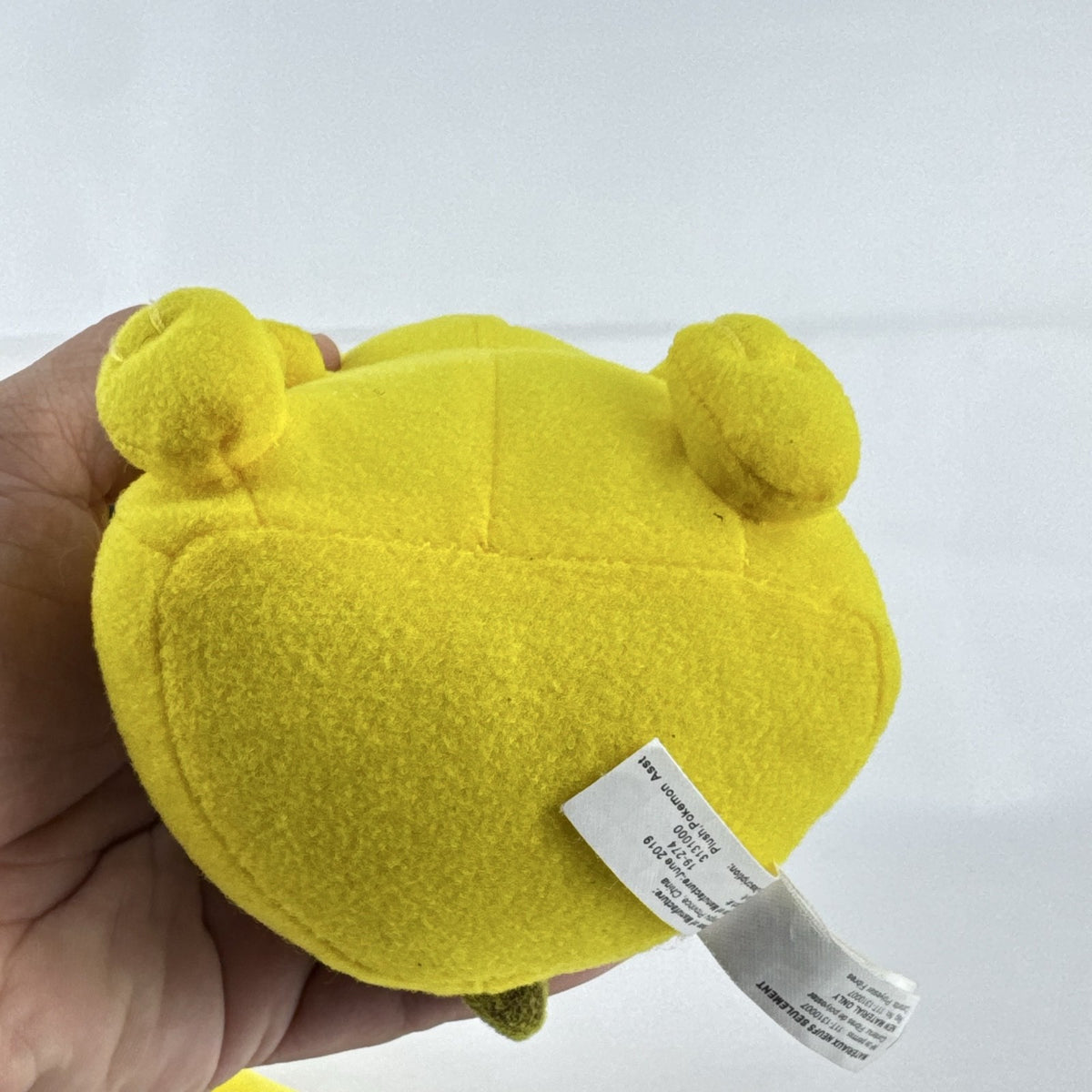 Pair of two yellow Pokémon Pikachu plush stuffed animals in 7-inch and 8.5-inch sizes.
