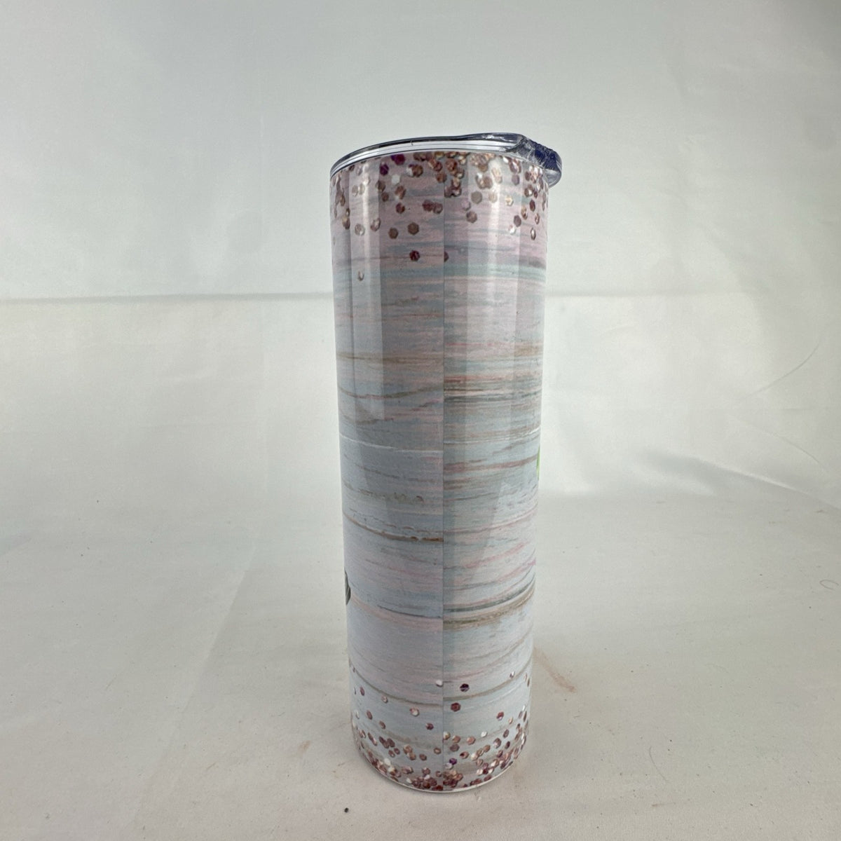20 oz stainless steel skinny tumbler featuring a patriotic American flag cowboy boot and floral design.