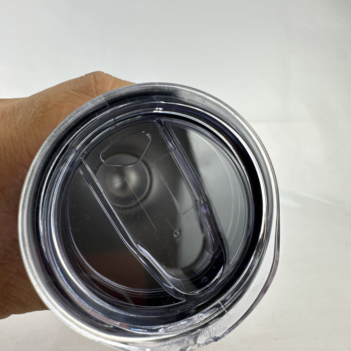 20 oz stainless steel skinny tumbler featuring a patriotic American flag cowboy boot and floral design.