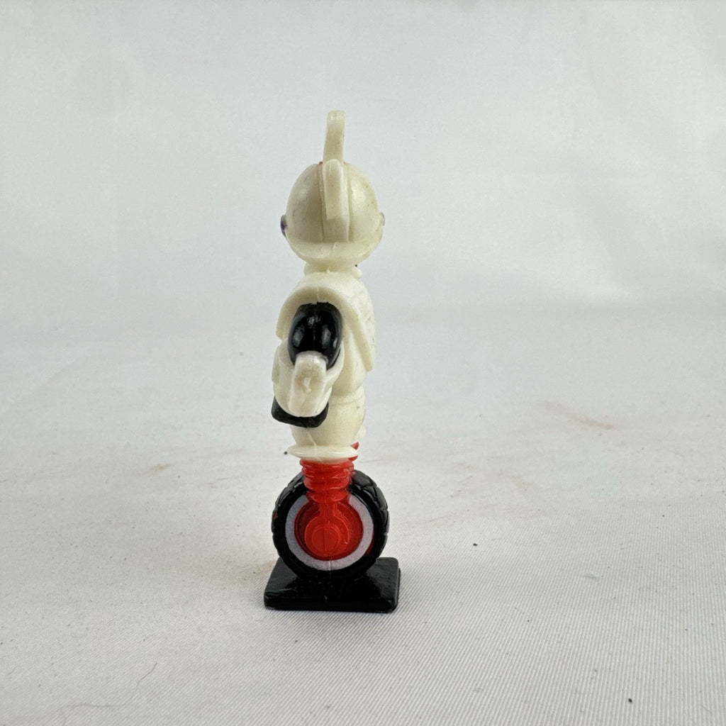 Vintage 1991 Disney and Kellogg's molded plastic Gizmoduck cereal toy figure on unicycle wheel